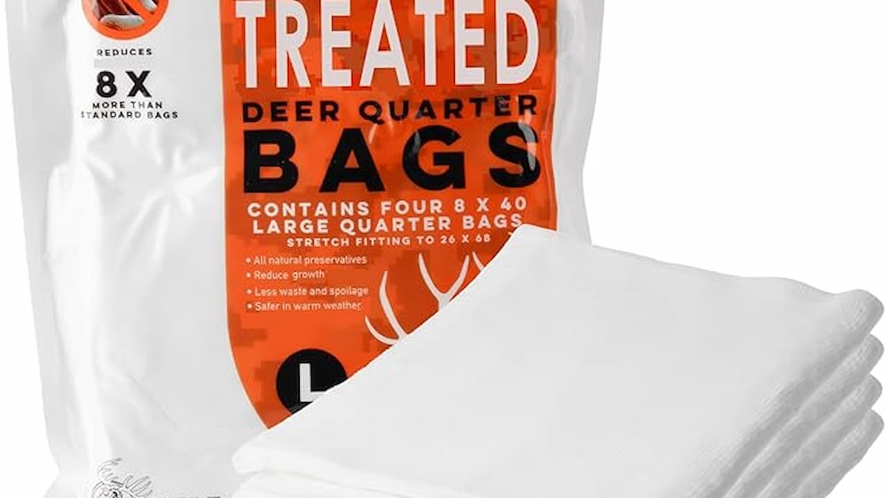 Treated deer quarter bags with folded white game bags beside the packaging