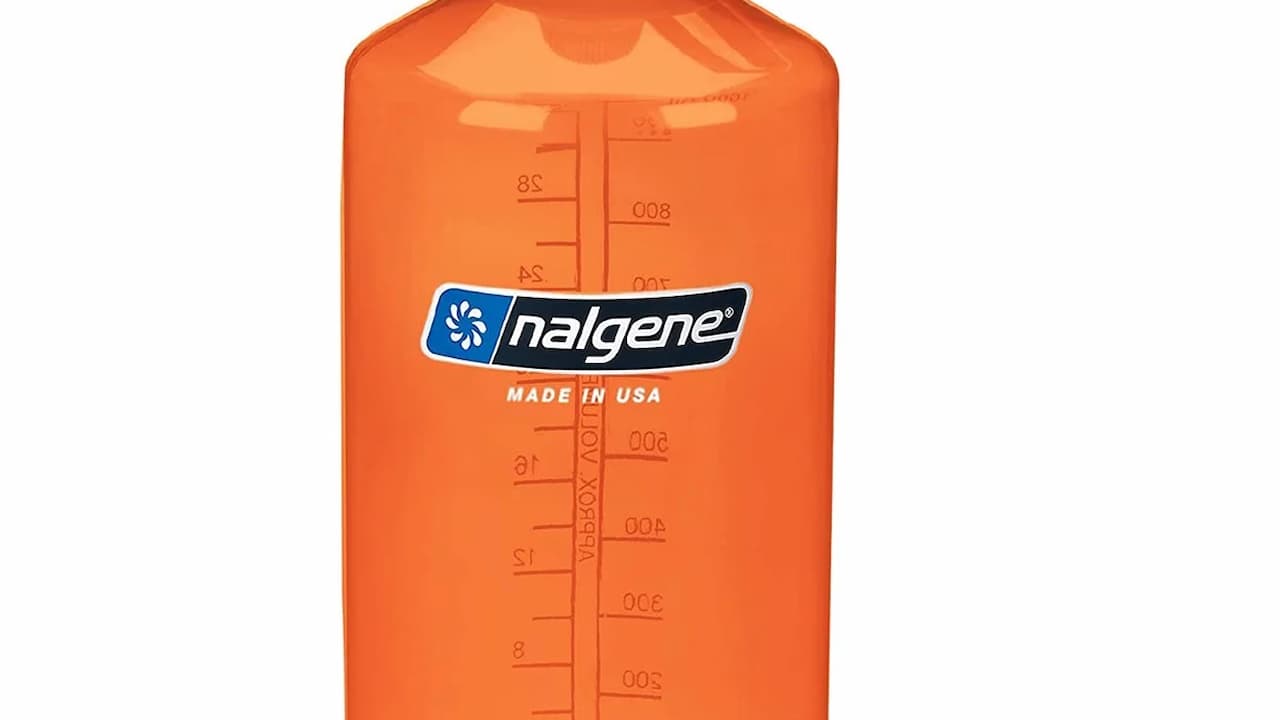 Orange Nalgene Sustain 32 oz narrow-mouth water bottle with volume markings and "Made in USA" label